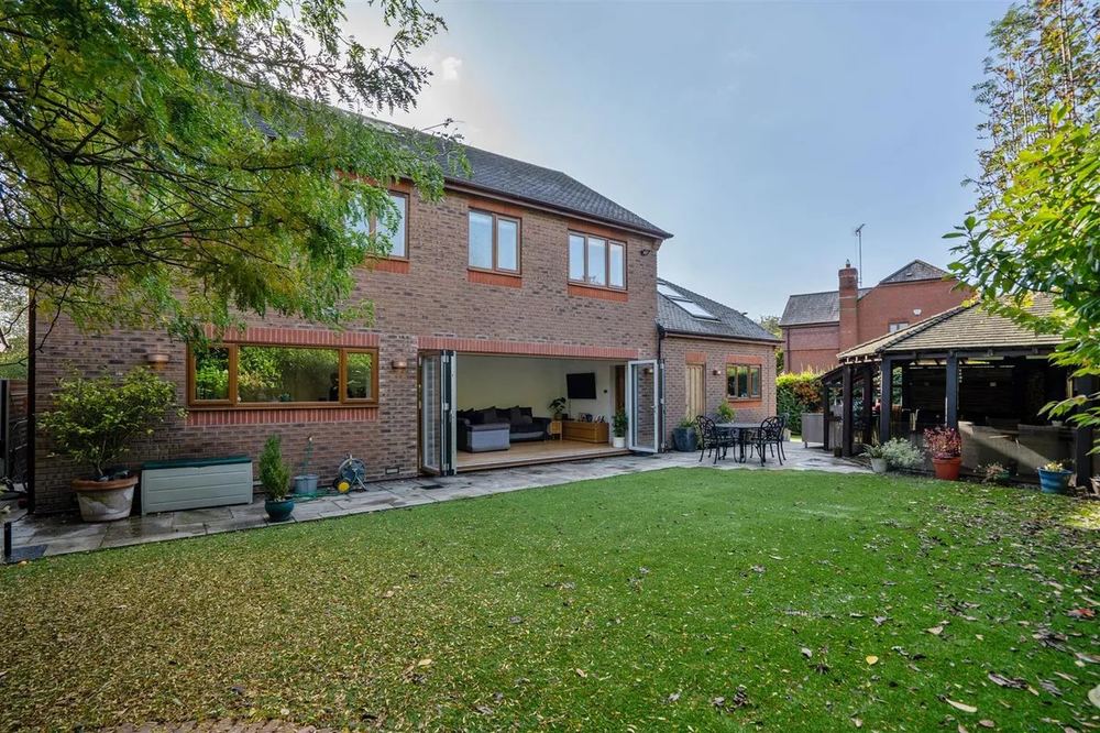 Large detached house rear extension with bi-fold doors onto garden